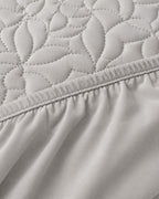 Quilted Mattress Protector — close-up on a fold