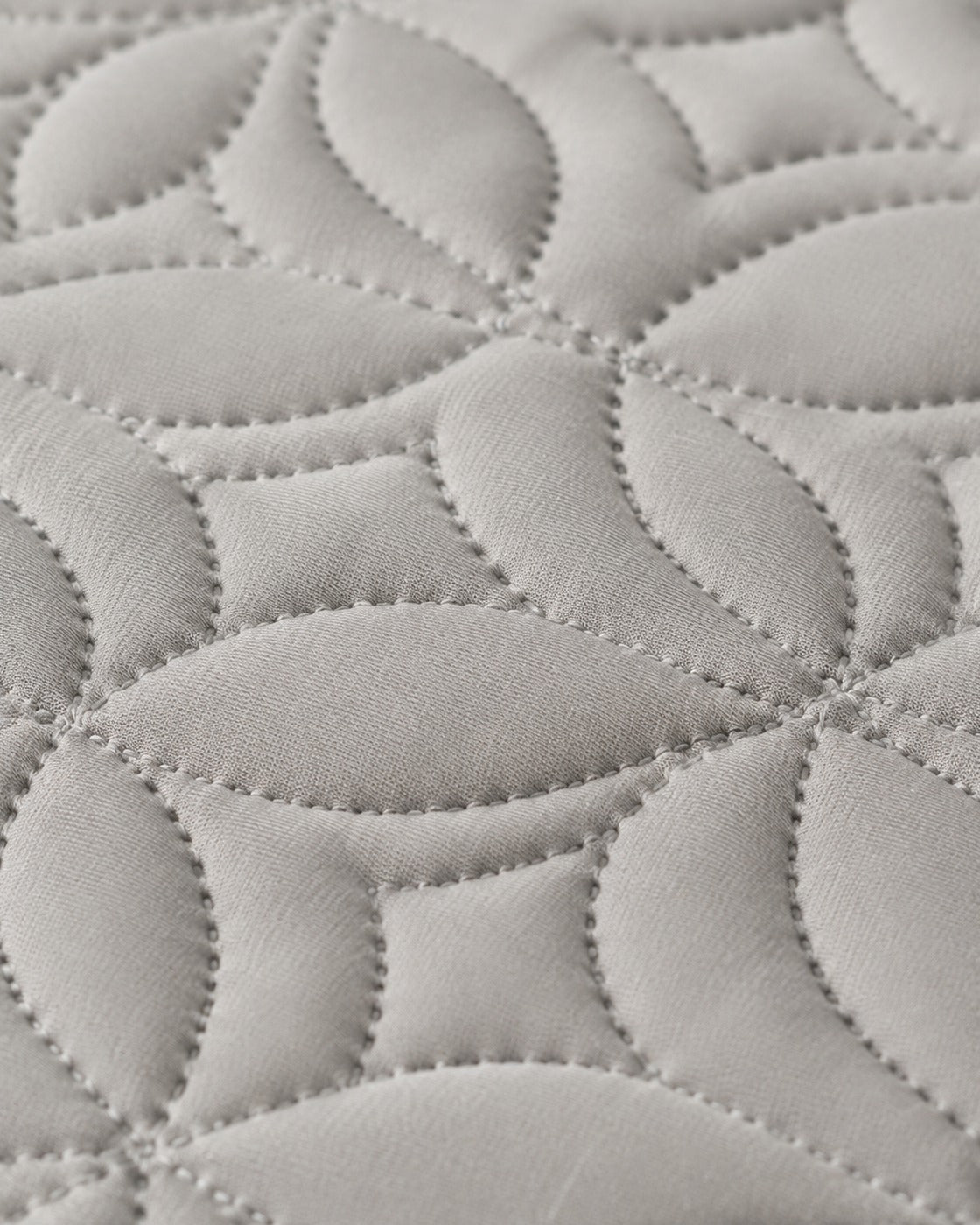 Quilted Mattress Protector — macro of the woven texture