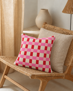 Red Gingham Cotton-Linen Pillow Cover, on a rattan armchair