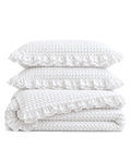 Ruffled Bubble Cotton Seersucker Duvet Cover Set in White, folded with its shams