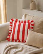 Ruffled Cabana Stripe Cotton Sateen Pillow Cover in Red & White, on a linen sofa