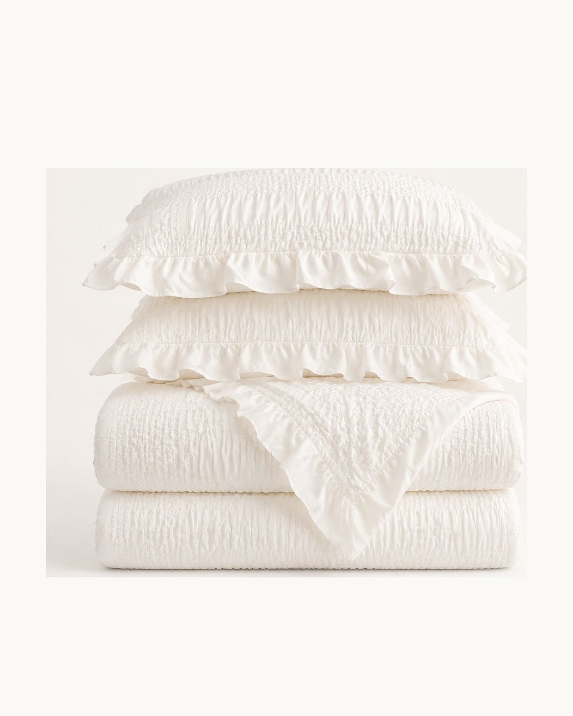 Ruffled Seersucker Duvet Set — folded set on a plain background