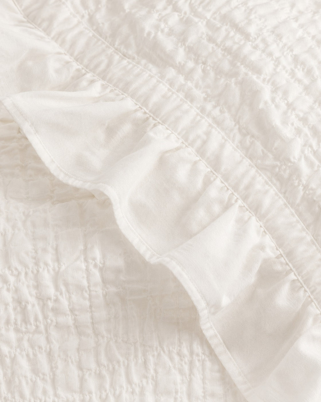 Ruffled Seersucker Duvet Set — close-up on a fold