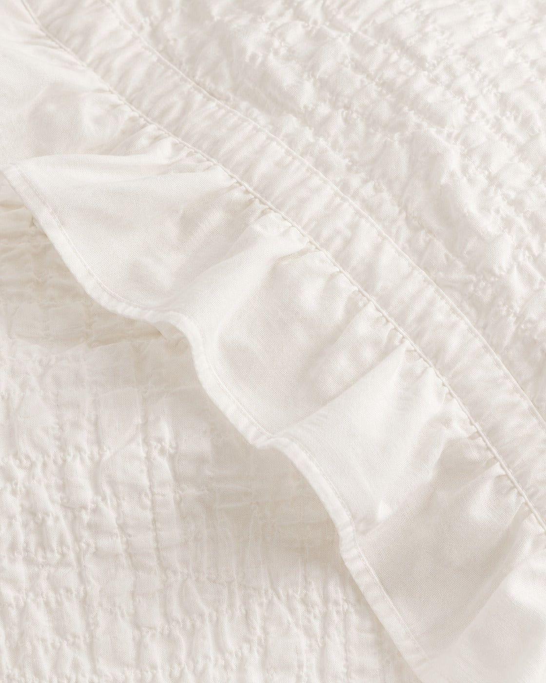 Ruffled Seersucker Duvet Set — close-up on a fold