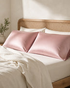 Sateen Pillowcases, Set of 2 — on a made bed, morning light