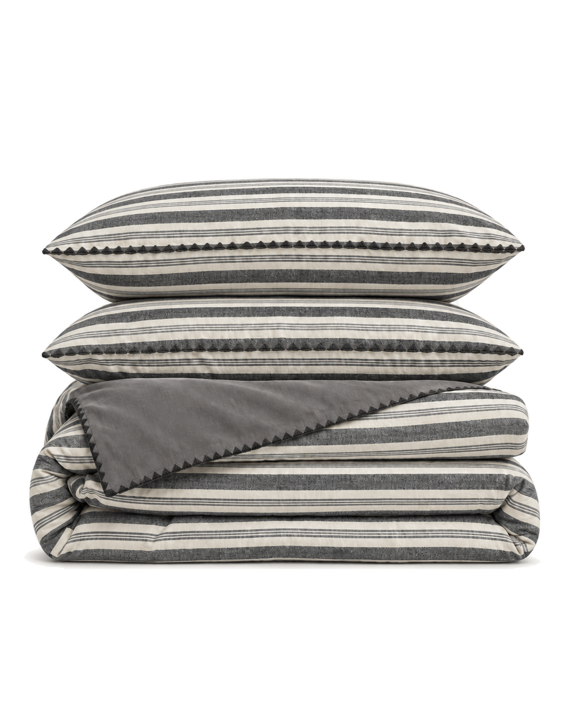 Shell Stitch Stripe Washed Cotton Duvet Cover Set in Charcoal, folded with its shams