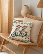 Skeleton Tandem Cotton Velvet Pillow Cover, on a rattan armchair