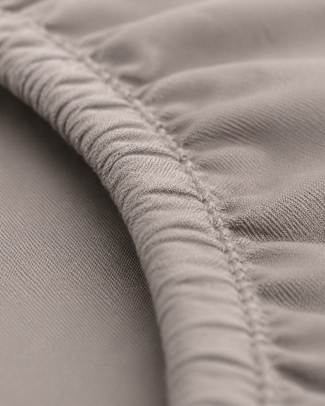 Solid Fitted Sheet — macro of the woven texture