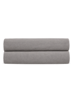 Solid Fitted Sheet, folded on a plain background