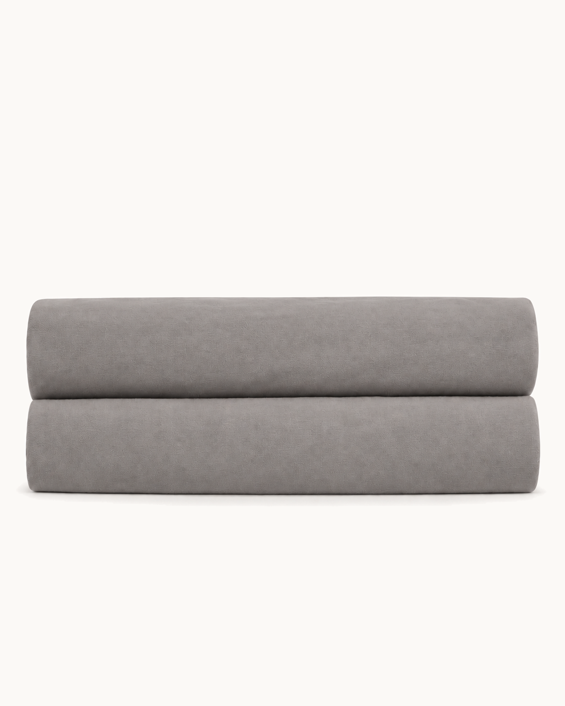 Solid Fitted Sheet, folded on a plain background