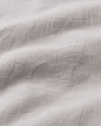 Textured Solid Duvet Set — macro of the woven texture