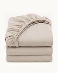 Textured Solid Fitted Sheet — folded set on a plain background