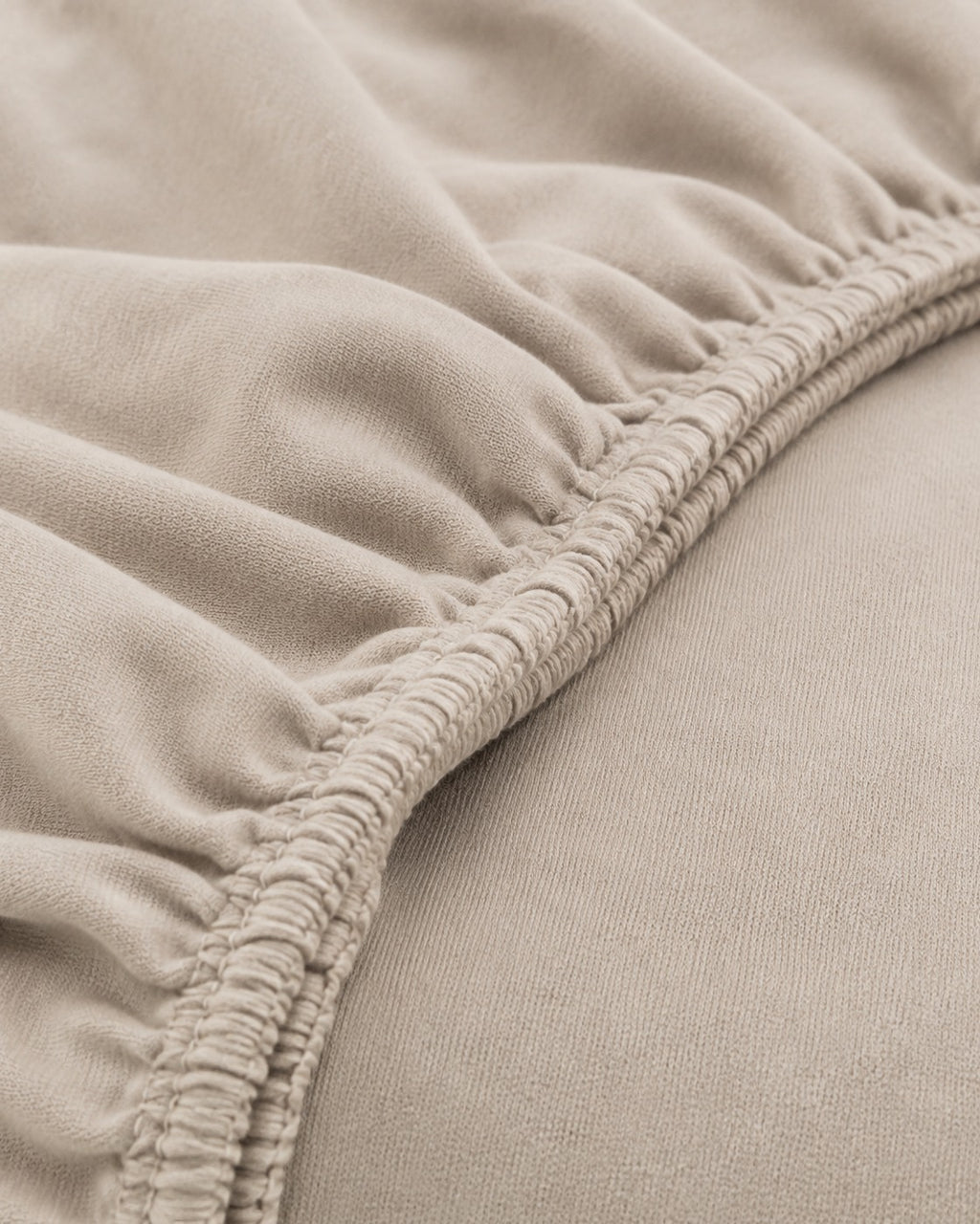 Textured Solid Fitted Sheet — close-up on a fold
