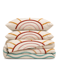 Tufted Sunrise Cotton Duvet Cover Set, folded with its shams