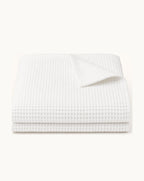 Waffle Cotton Coverlet — folded set on a plain background