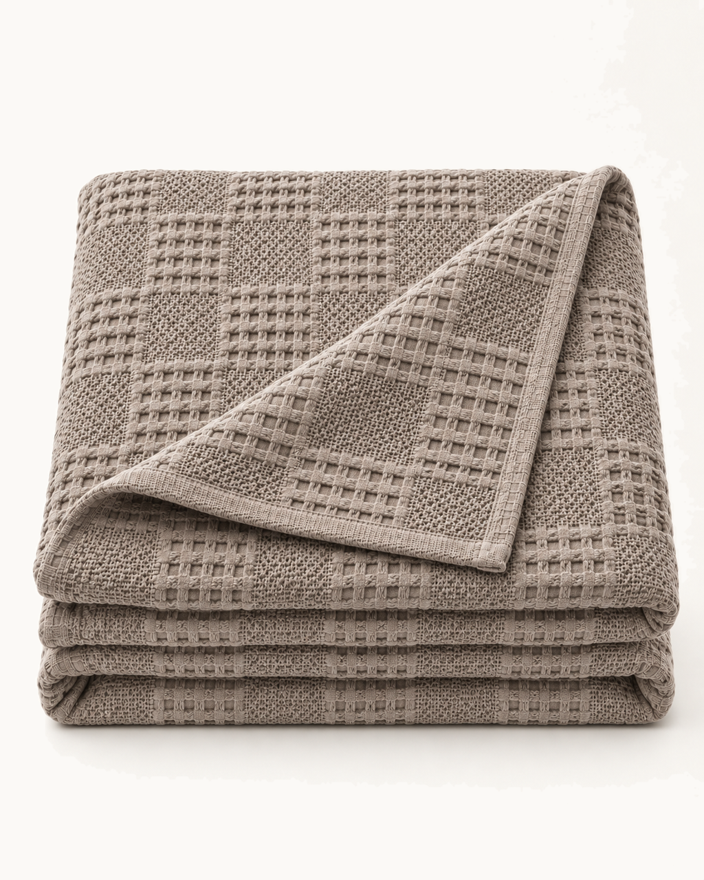 Waffle Knit Throw, folded on a plain background
