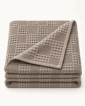 Waffle Knit Throw, folded on a plain background