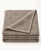 Waffle Knit Throw, folded on a plain background