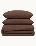 Washed Cotton Sheet Set, the four pieces folded on a plain background