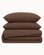 Washed Cotton Sheet Set, the four pieces folded on a plain background