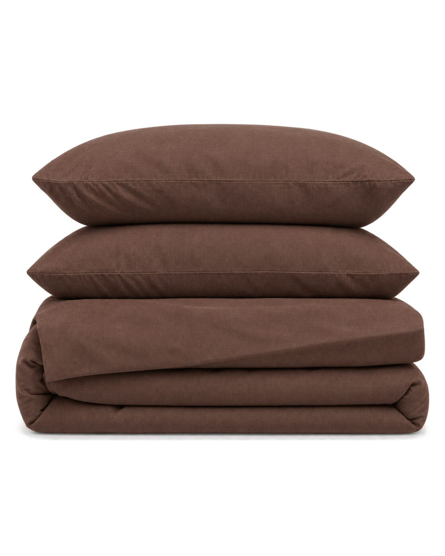 Washed Cotton Sheet Set, the four pieces folded on a plain background