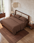 Washed Cotton Sheet Set, on an unmade bed in morning light