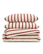 Wavy Stripe Washed Cotton Duvet Cover Set in Cherry, folded with its shams