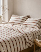 Woven Stripe Duvet Set — on a made bed, morning light